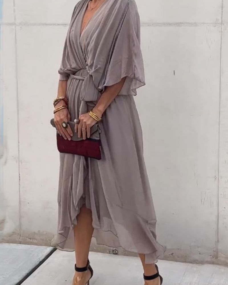 Kjole Femme Cristi – Elegant slå-om kjole med flagermusærmer & asymmetrisk kant