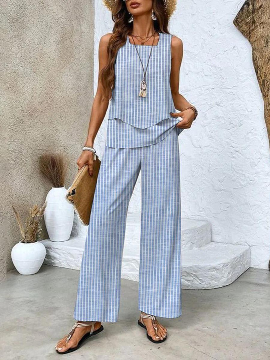 Completo da donna Ghislaine: elegante top e pantaloni con stampa floreale, vestibilità comoda e valorizzante