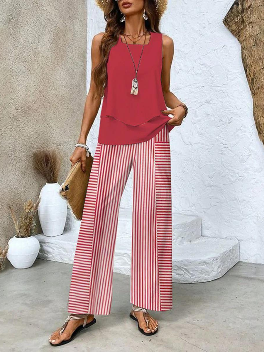 Completo da donna Ghislaine: elegante top e pantaloni con stampa floreale, vestibilità comoda e valorizzante