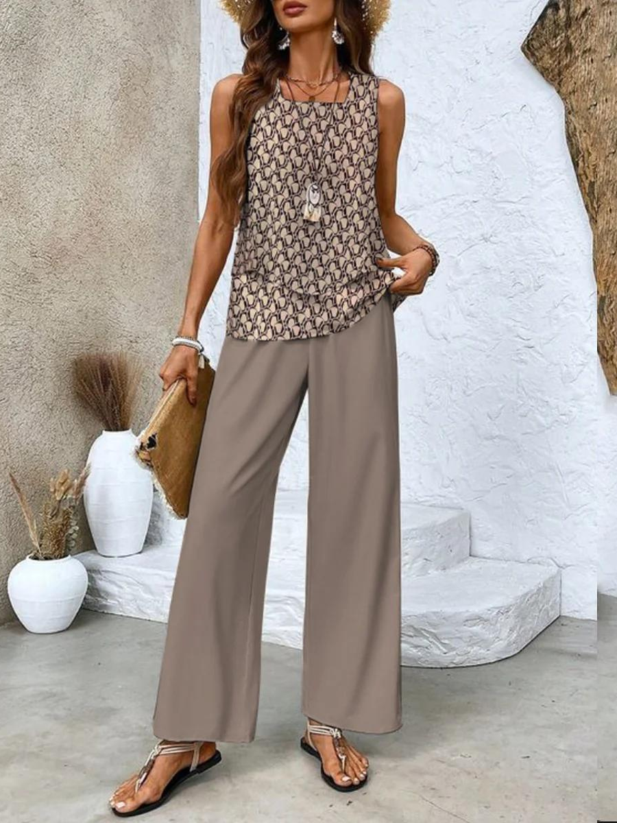 Completo da donna Ghislaine: elegante top e pantaloni con stampa floreale, vestibilità comoda e valorizzante