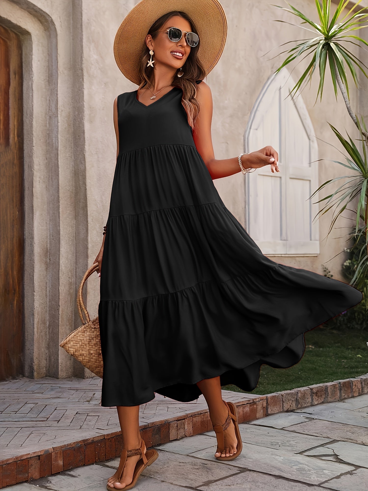 Robe Vellaria – Lange Zomerse Mouwloze Vloeiende Jurk met Volants voor Stijlvolle Dames