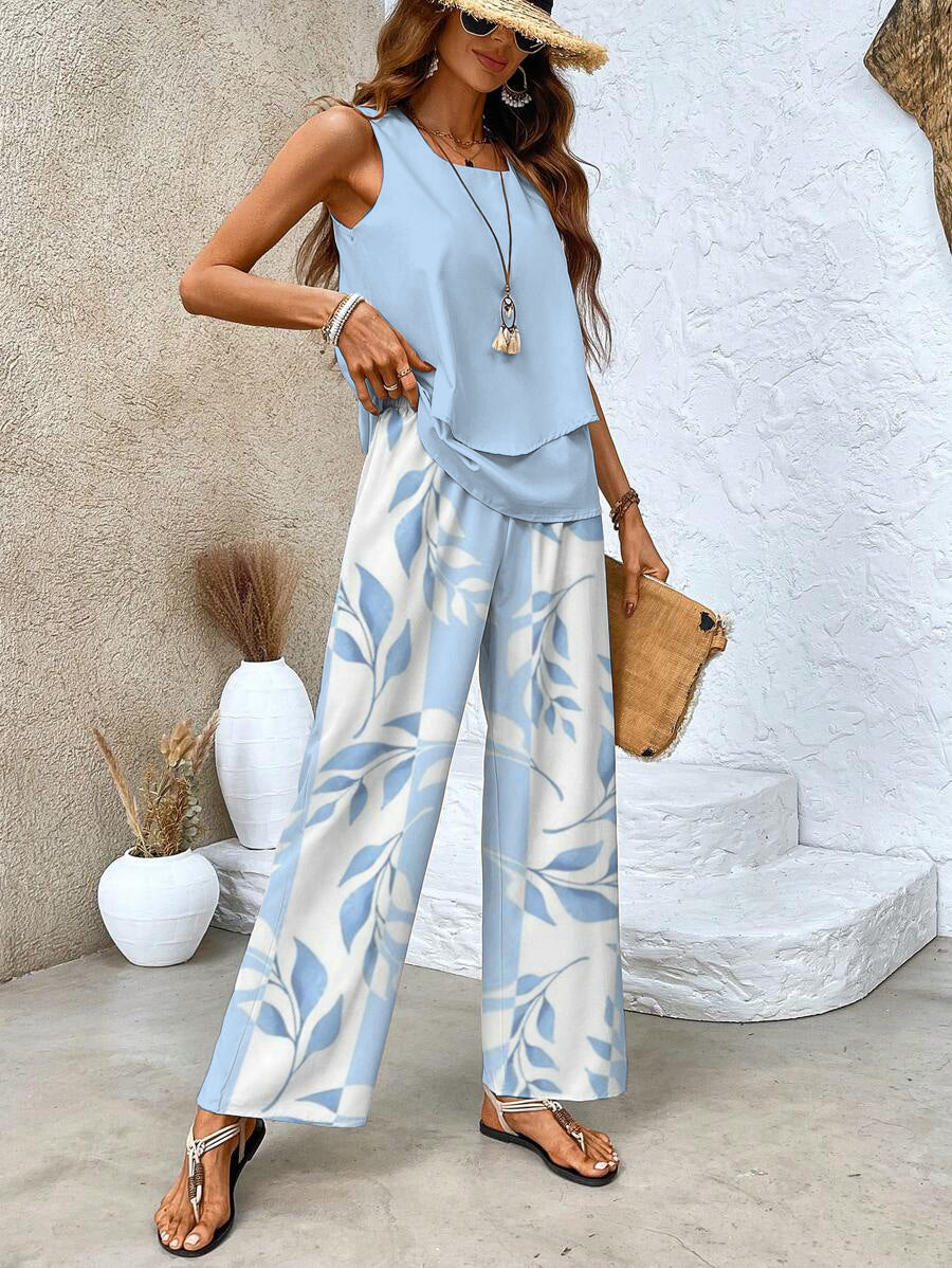 Completo da donna Ghislaine: elegante top e pantaloni con stampa floreale, vestibilità comoda e valorizzante