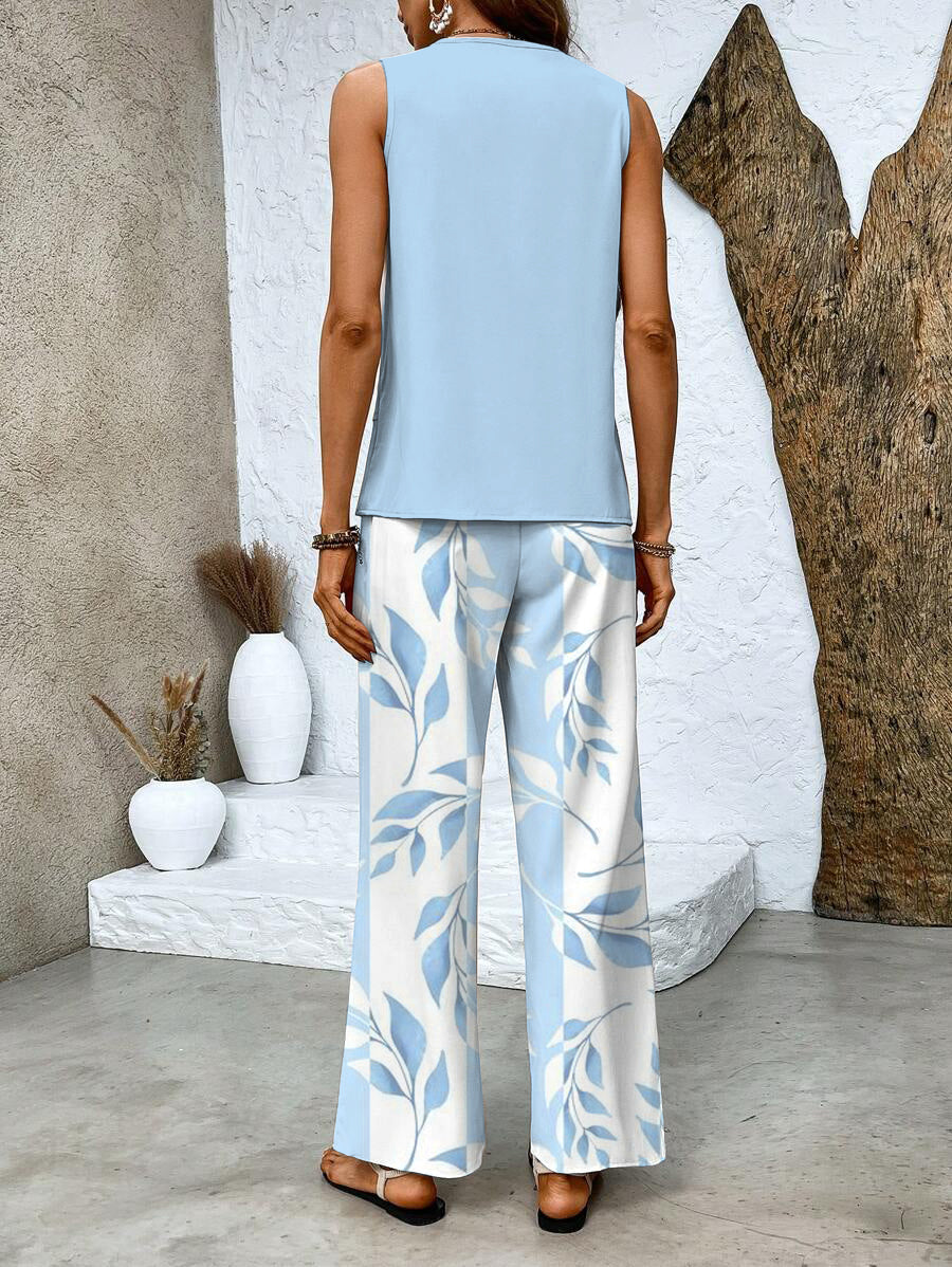 Completo da donna Ghislaine: elegante top e pantaloni con stampa floreale, vestibilità comoda e valorizzante