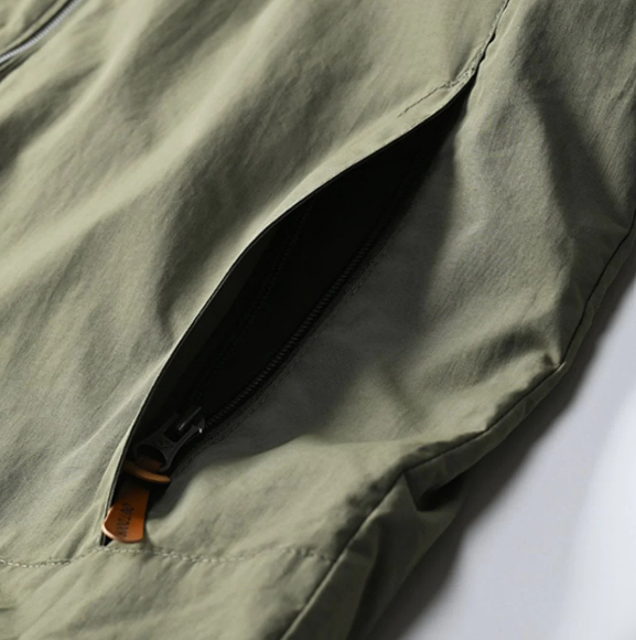 Ethan Casaco Homem – Casaco Impermeável para Exterior com Capuz Ajustável e Múltiplos Bolsos