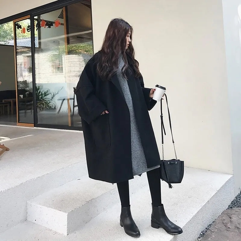 Megan Manteau Long Oversize Femme – Frakke i uld med bælte & dobbeltradet elegant knaplukning